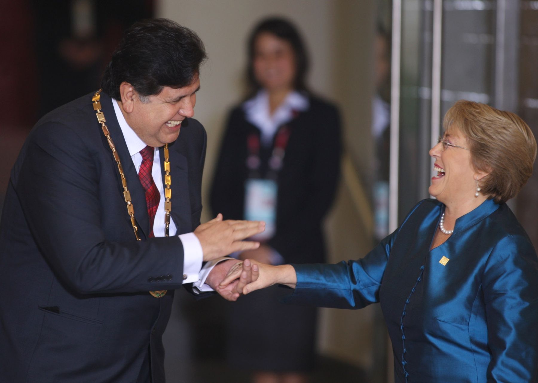 Alan Garcia und Michelle Bachelet